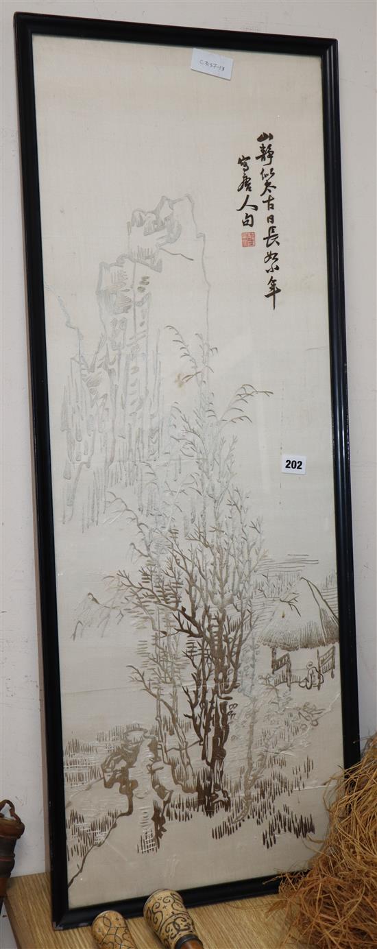 A Chinese embroidered silk picture of a landscape 101 x 35cm excl. frame